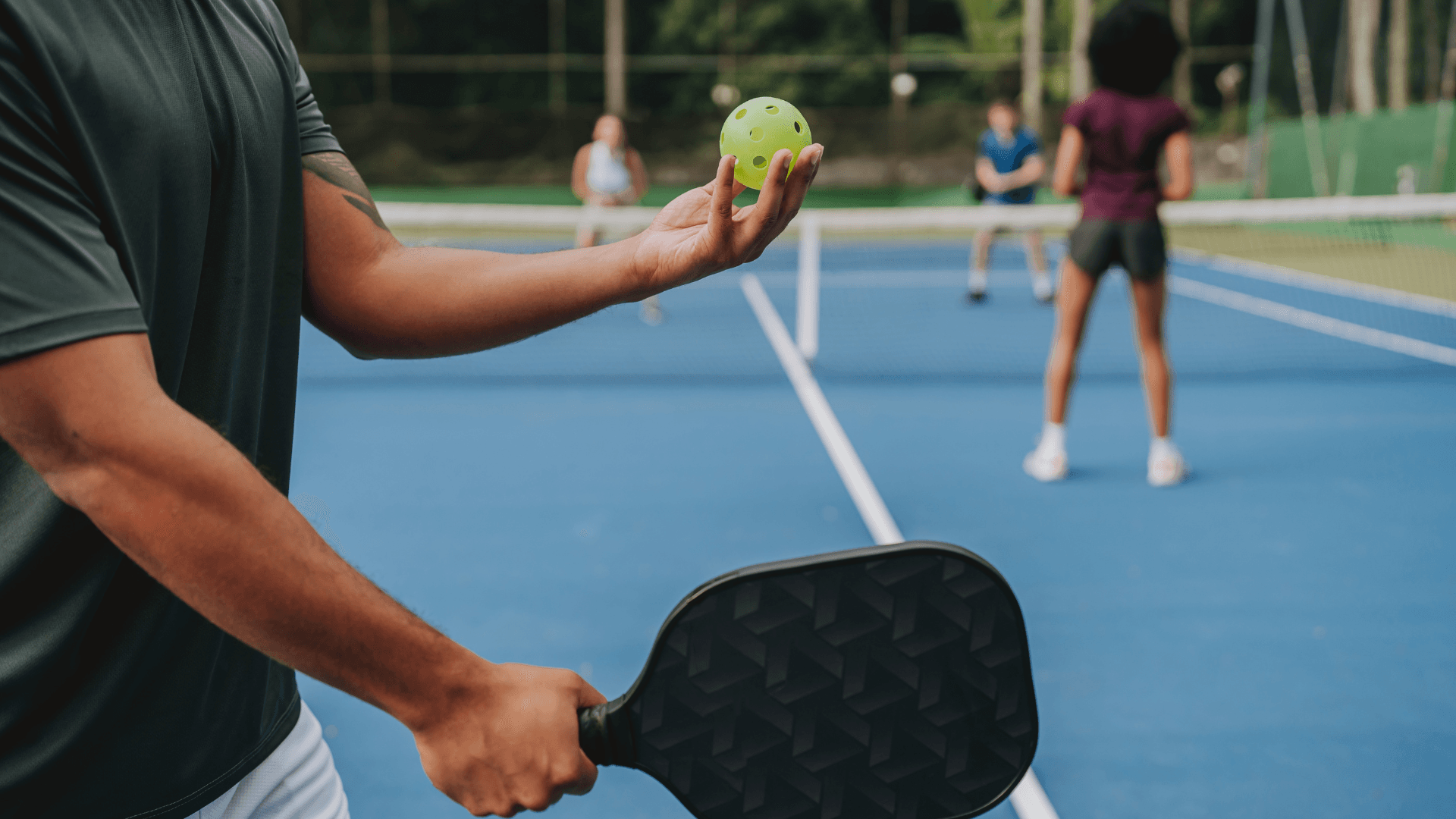 Pickleball players using a public court